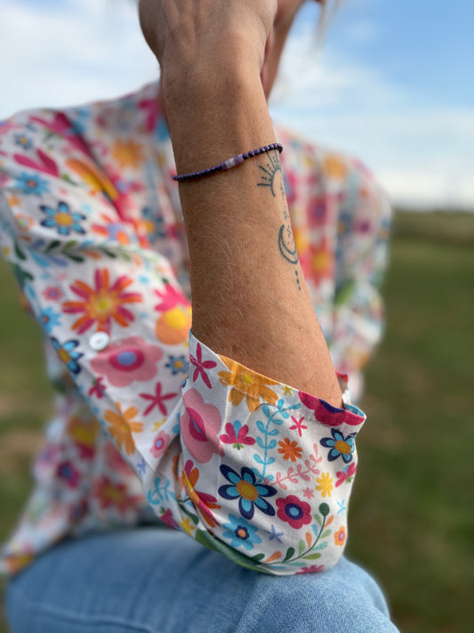 Bracelet améthyste porté au poignet