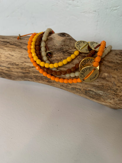 Bracelet Carpe Diem orange  jaune doré en accumulation